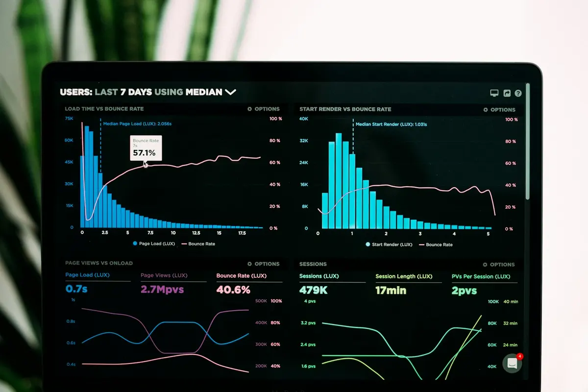 Printed charts and a laptop used to compare setup timelines