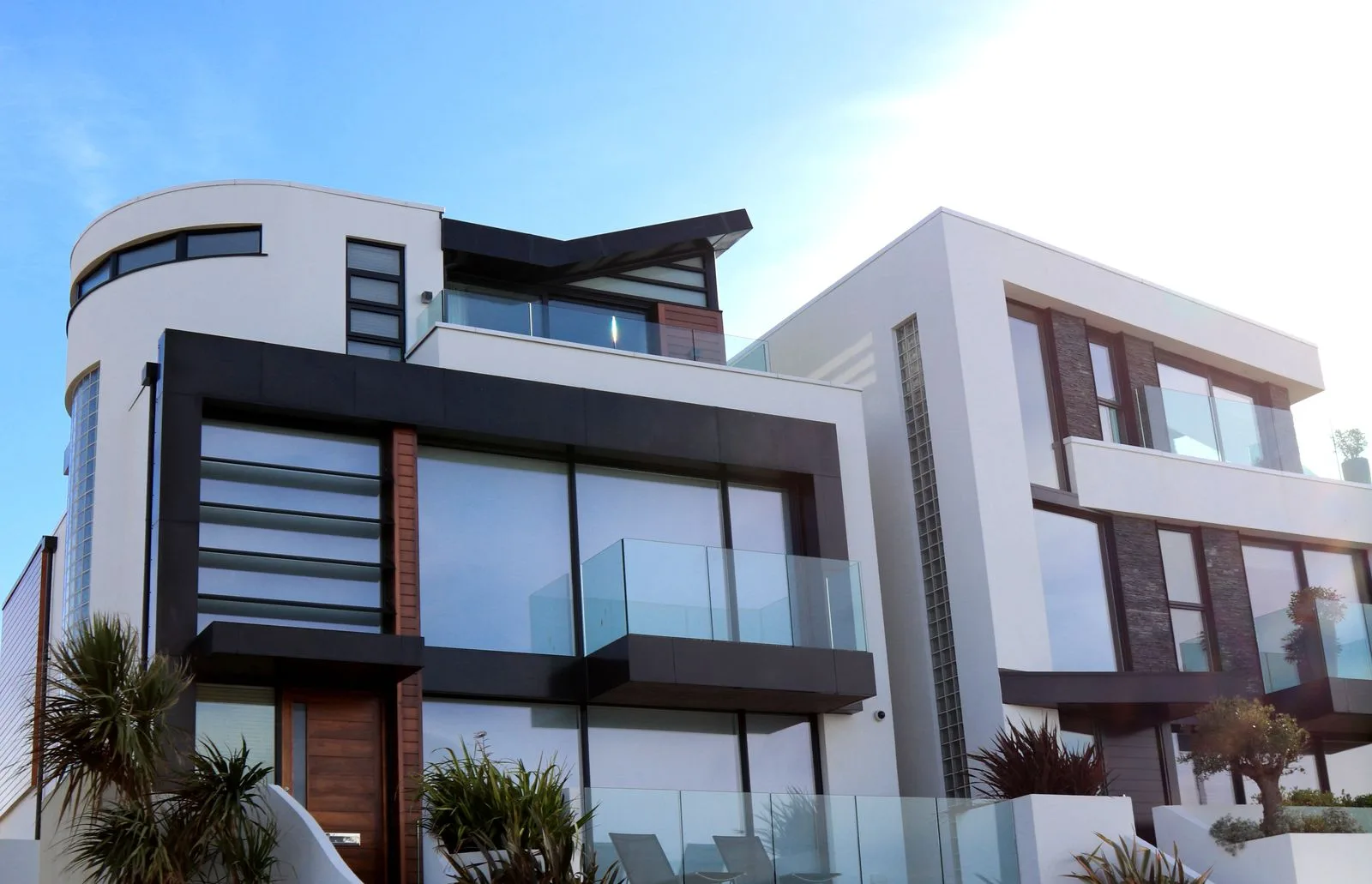 A completed residential block: the building belongs to the developer, the ground beneath it is held on a term of years
