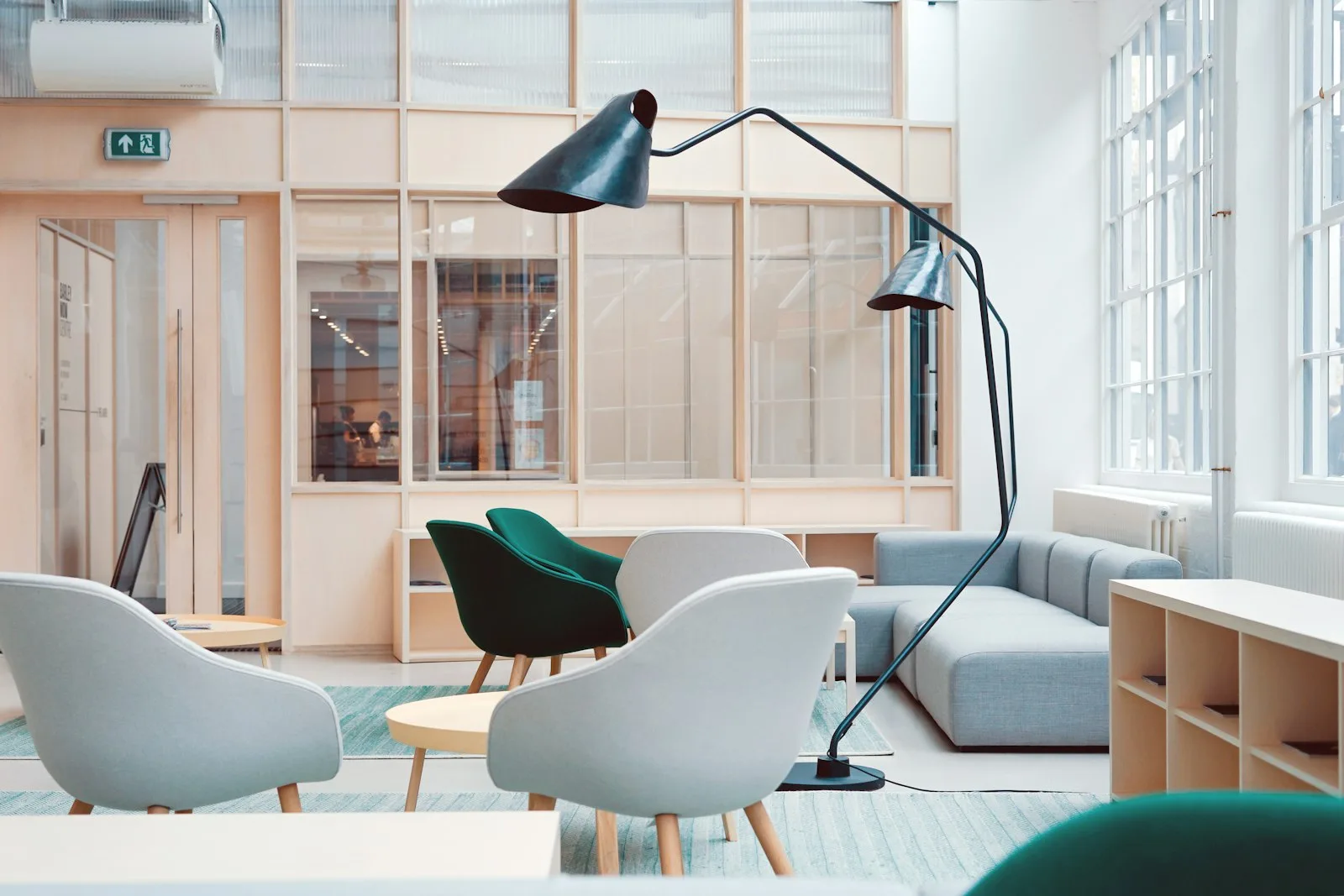 Bright studio-office interior — sports and creative investment still needs the sector board’s paper