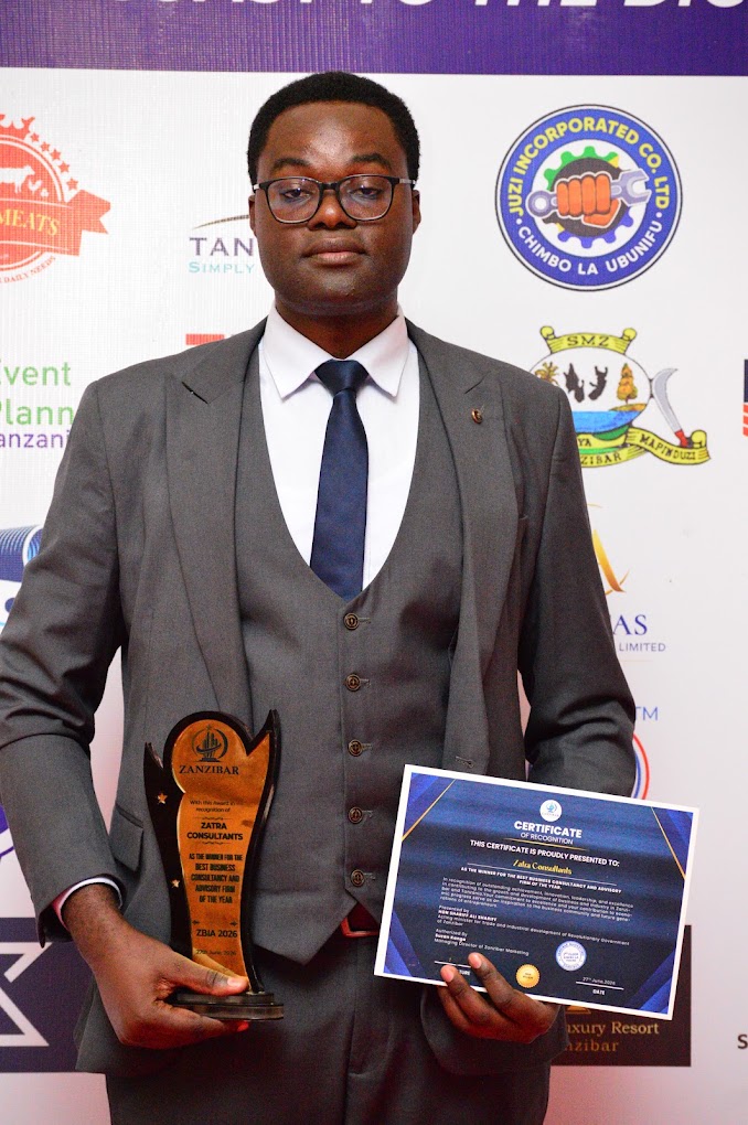 Joseph Marwa holding Zatra Consultants’ ZBIA 2026 Best Business Consultancy and Advisory Firm award.