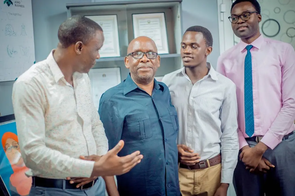 Zatra Consultants advisers discussing an agribusiness file with a client at the Dar es Salaam office.