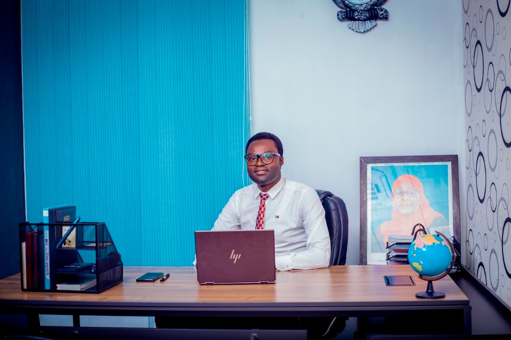 A Zatra Consultants adviser working on a client file at his desk in the firm's Dar es Salaam office.